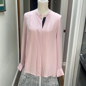 Vince silk blouse slightly sheer.